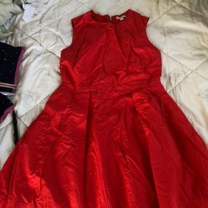 Gap size 2 / 12 to 14 Poster red, pleated, lined dress with pockets both sides.
